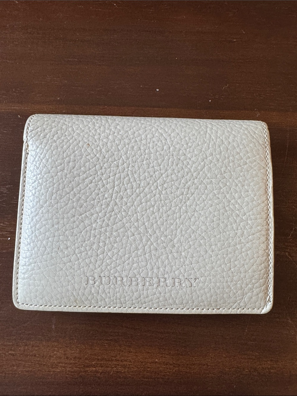 Burberry Pebbled Leather Bifold Wallet in Off-White